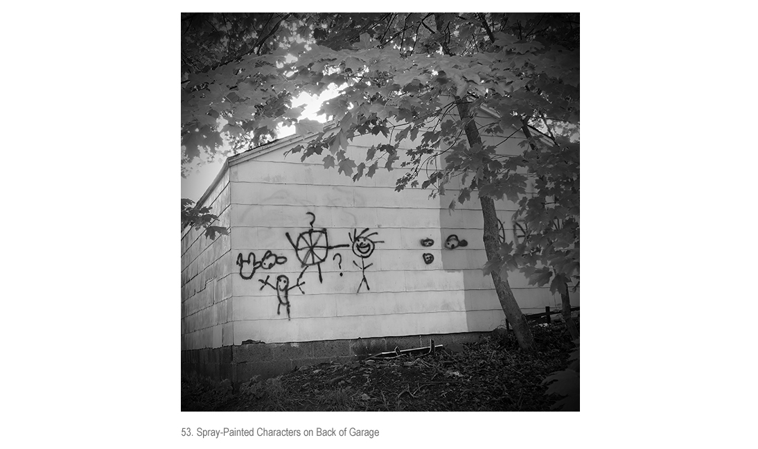 Spray-painted Characters on Garage